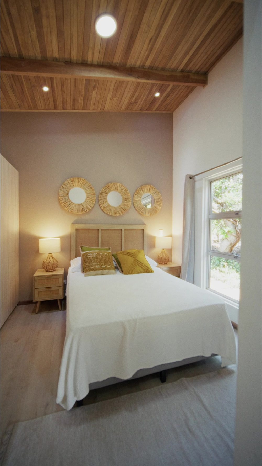 Bedroom with rattan headboard